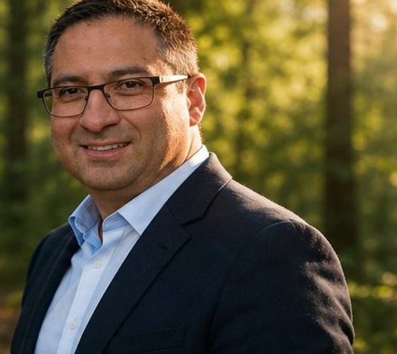 Coach standing on a forest path